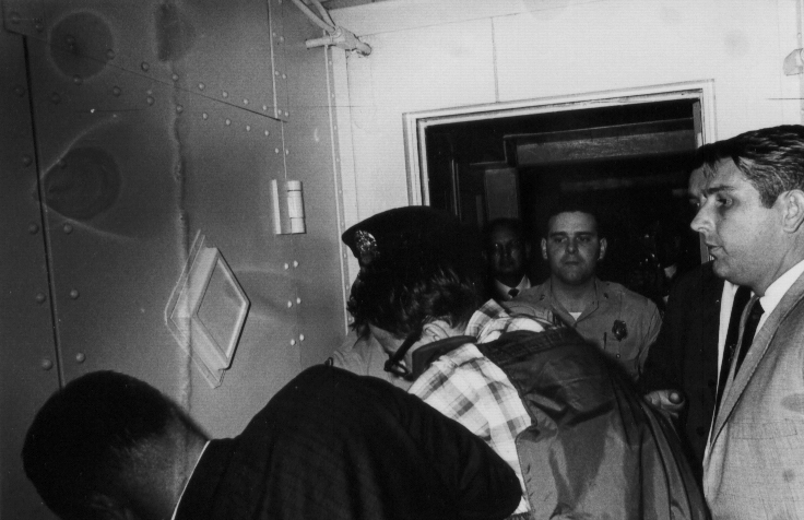 09James Earl Ray being brought into jail 09.jpg